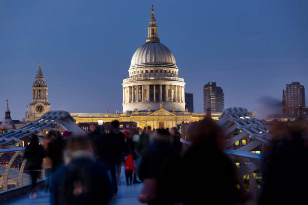 Millennium Bridge and St Paul's Cathedral in downtown London England UK