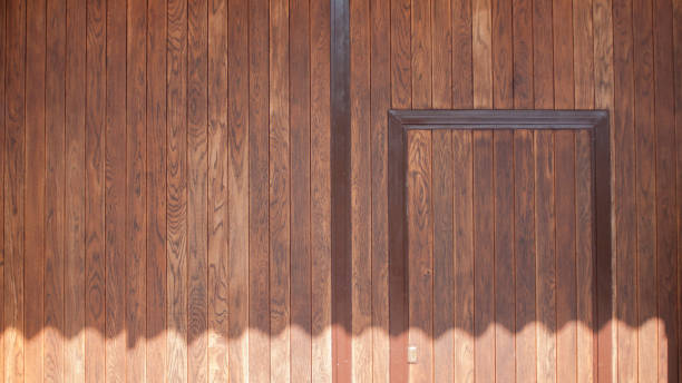 istock Eave shadow in wooden door 1740507125