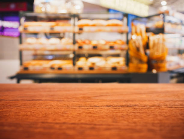 istock Table top Bakery shelf Shop interior Blur background 1740511557