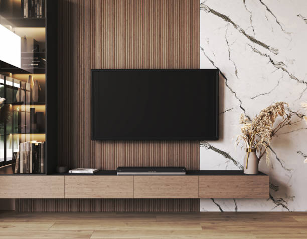 istock Classic expensive luxury light TV wall mock up with commode and wood panels. Modern interior living room with marble beige background. 3d rendering. High quality 3d illustration 1740544542