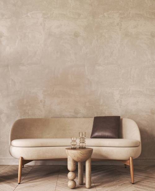 istock Japandi boho beige interior with sofa and stucco background. Light modern australian livingroom. Mockup empty brown wall. 3d rendering. High quality 3d illustration 1740545667