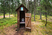 Toilet in the forest in summer in Estonia.