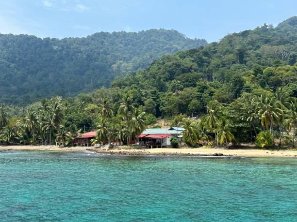 istock Village houses by the seashore 1740562255
