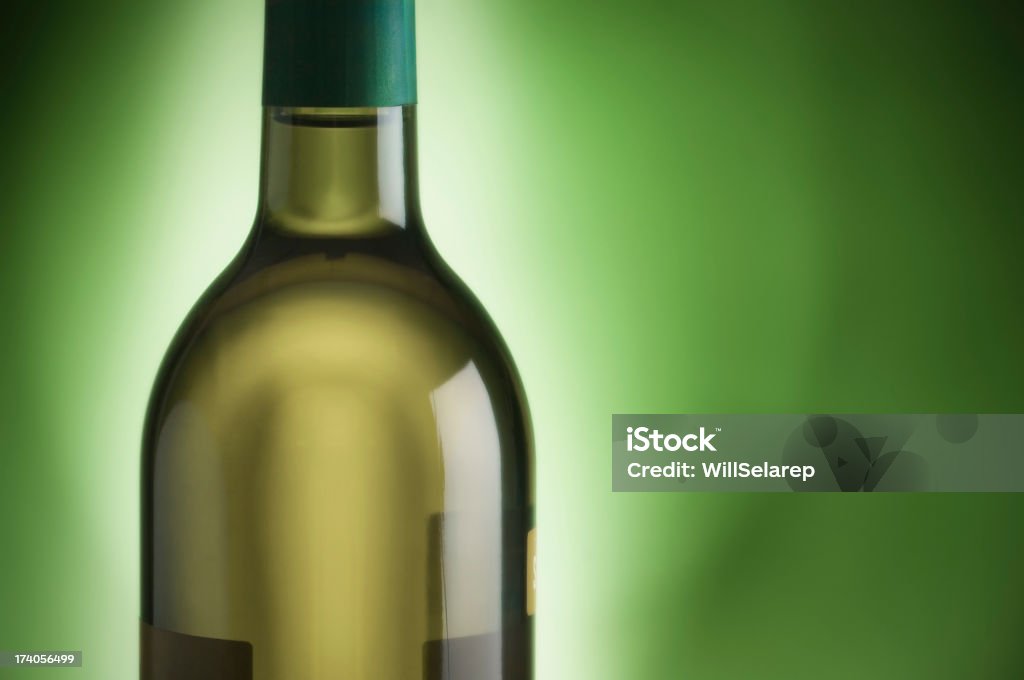 White Wine in green bottle White Wine in green bottle on horizontal composition Alcohol - Drink Stock Photo