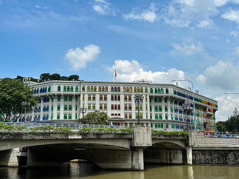 Hill Street, Downtown Core, Singapore - February, 10 2023: Stock photo showing view seen of Colman Bridge crossing the Singapore River.