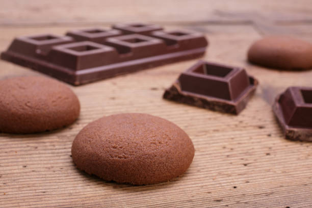 istock dark chocolate with chocolate chip cookies on rustic wooden table 1740593800