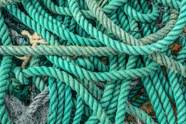 istock Old blue frayed ship rope 1740597574