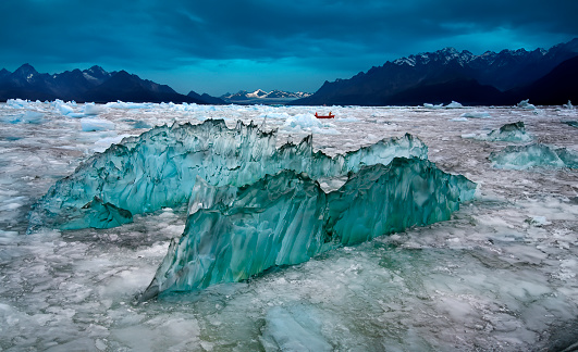 Dense green Amorphus glacial ice floating in Laguna San Rafael in Patagonia, Chile in South America.