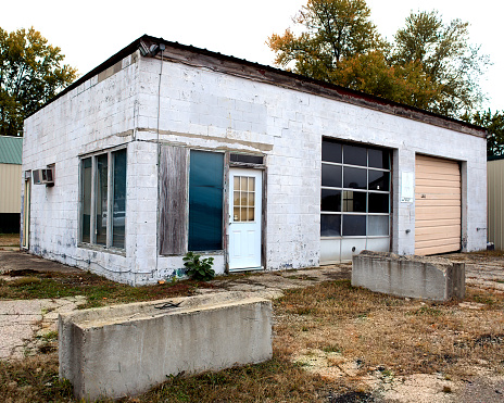 Cedarville Ohio USA October 16, 2023: A small shabby retail building becoming dilapidated after years of neglect.