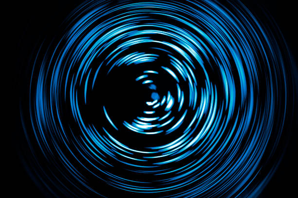 istock dark light painting abstract background with colorful spiral curves 1740617676