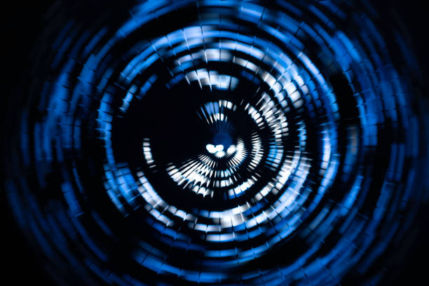 Black background with creative lighting with blue light to use as a wallpaper or presentation