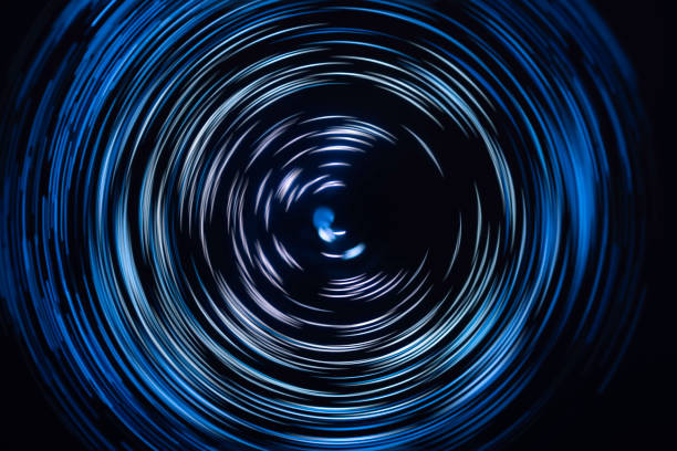 istock dark light painting abstract background with colorful spiral curves 1740617691