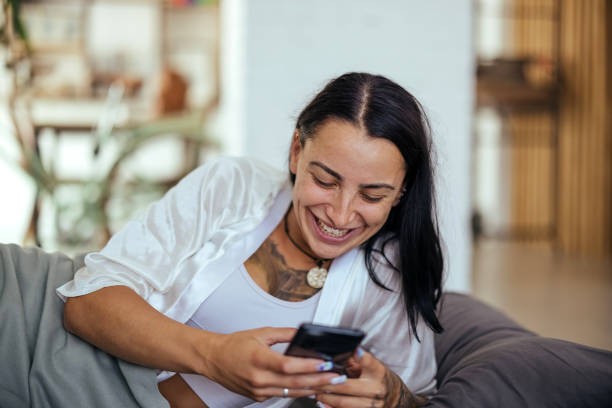 istock Woman using smart phone in bed in the morning 1740618834
