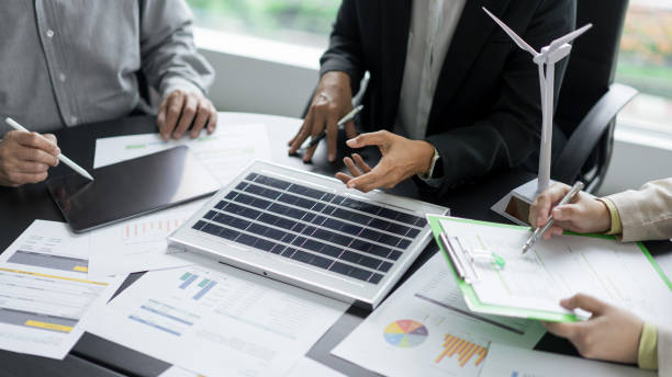 istock Alternative energy environment business team discuss about solar cell panel and renewable energy 1740626416