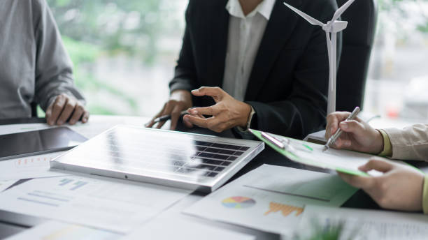 istock Alternative energy environment business team discuss about solar cell panel and renewable energy 1740626429