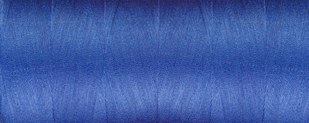 istock texture of threads for a sewing machine blue colors on a white background 1740631563