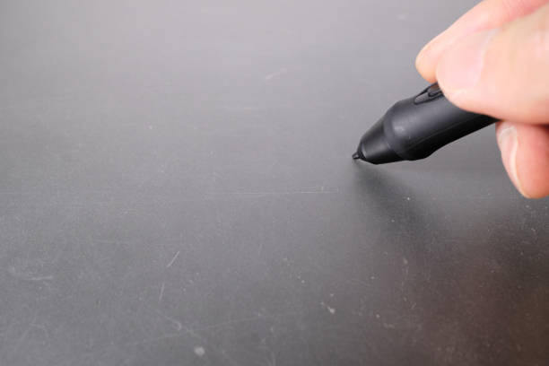 istock Image material of a person holding a pen tablet 1740633183