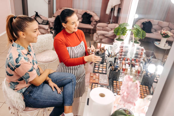 istock Young woman doing makeup in beauty salon 1740641713