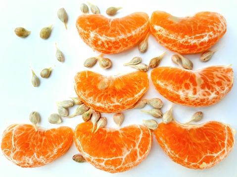 Healthy life style image. Be able to see orange pulps and texture of orange peel.