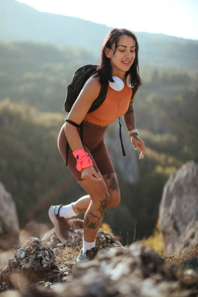 istock Young woman hiking on the mountain 1740687290