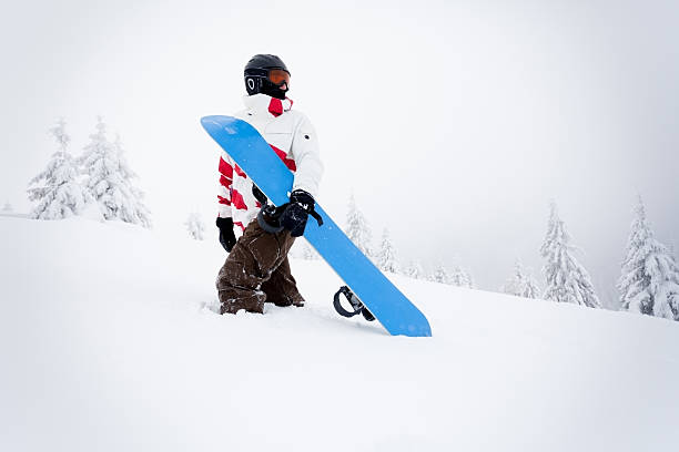 istock Lonley snowboarder on the mountain 174070433