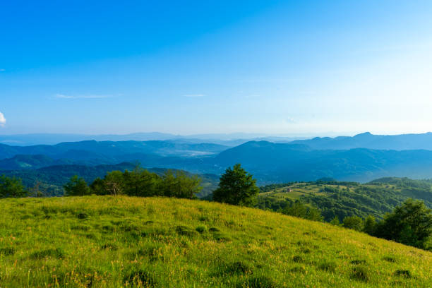 istock Mountains landscapes from green meadow on sunset 1740713722
