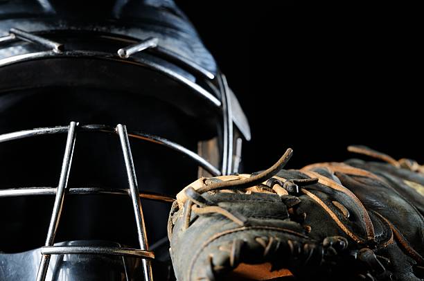 istock Baseball glove and catchers mask with copy space 174072190