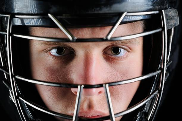 Close up of baseball catcher "Facial close up of baseball catcher, horizontal." catchers mask stock pictures, royalty-free photos & images