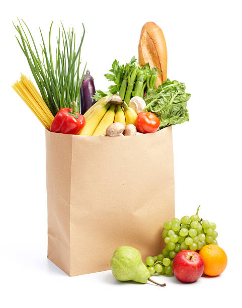 paper bag with groceries paper bag full of groceries isolated on white vegetables clipping path stock pictures, royalty-free photos & images