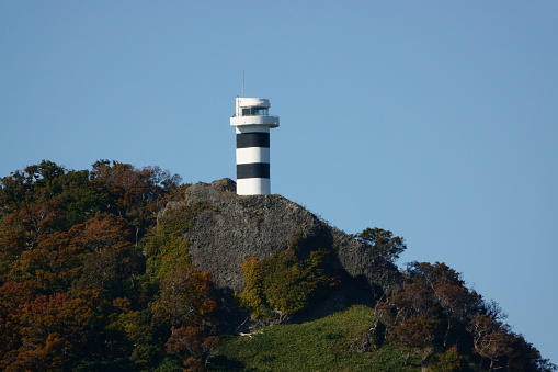 Shiretoko Lighthouse at Cape Shiretoko, Hokkaido in autumn.