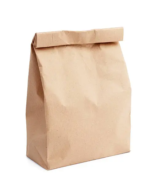 brown paper lunch bag isolated on white