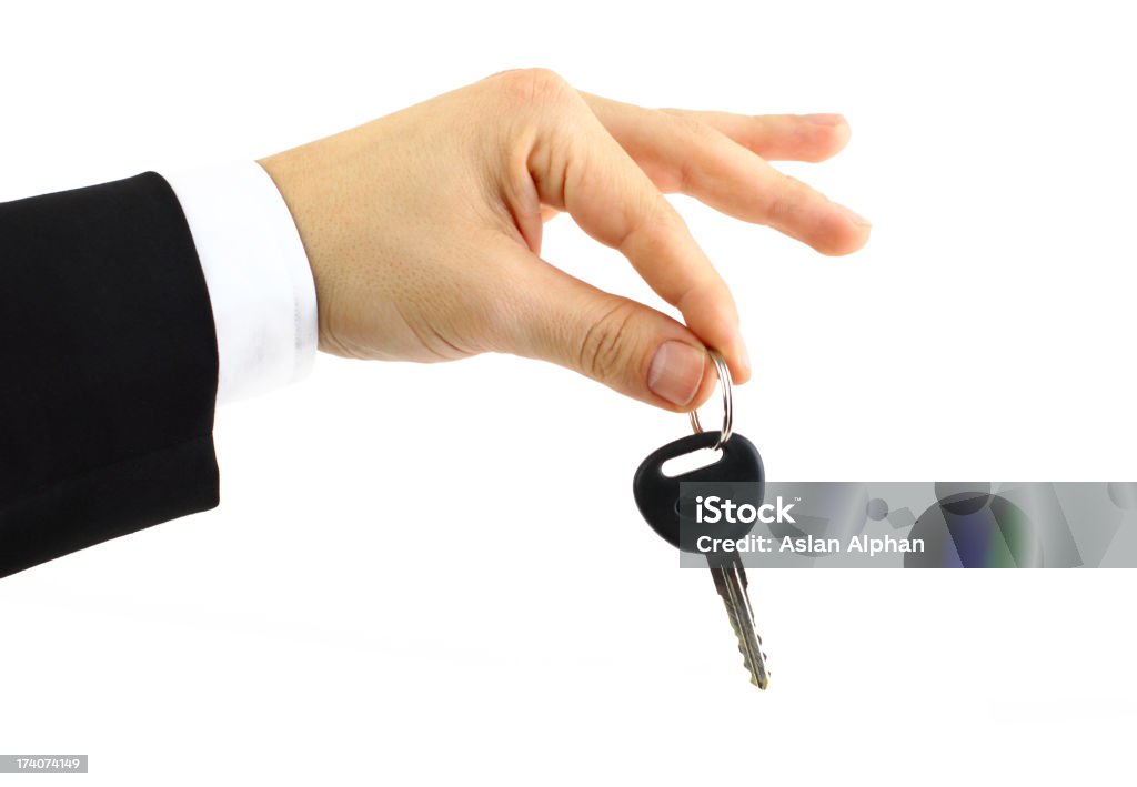 Empresário segurando uma chave de carro - Foto de stock de Acordo royalty-free