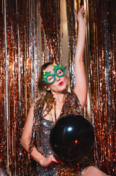istock Happy woman celebrating New Year. 1740741959