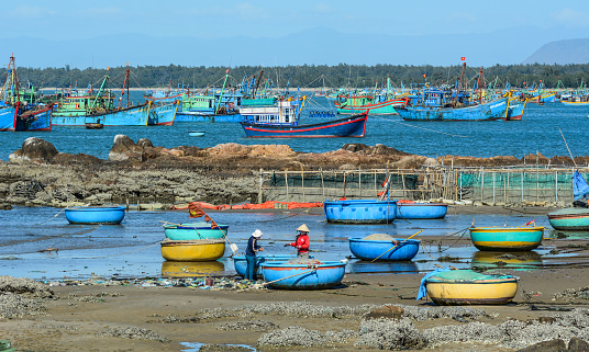 Nha Trang, Vietnam - Jan 26, 2016. Fishing boats on sea in Nha Trang, Vietnam. Nha Trang is a coastal city on the South Central Coast of Vietnam.