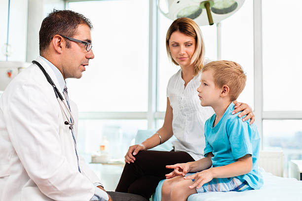 istock Mother and child in doctor's office 174074814