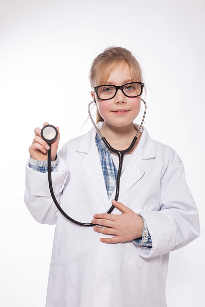 istock Young girl in doctors outfit 174077767