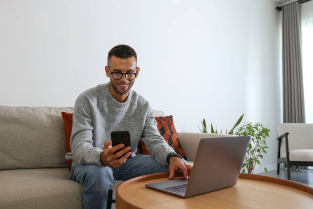 istock Mid adult man working from home. 1740778112