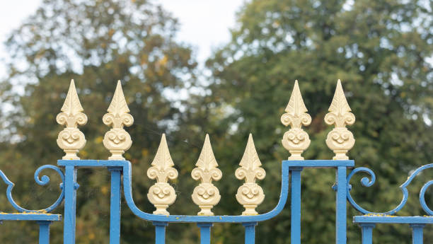 istock blue and gold ornate gates and posts 1740780413