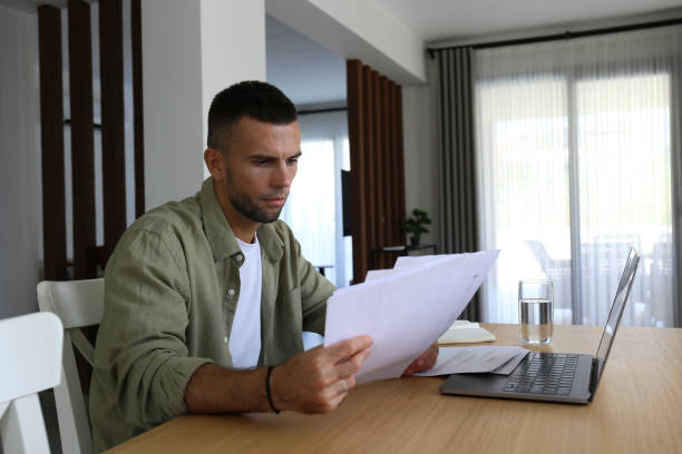 istock Mid adult man with debt anxiety. 1740781743