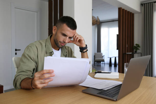 istock Mid adult man with debt anxiety. 1740783328