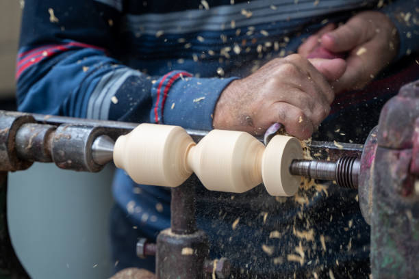 istock Close up of carpenter working in workshop. 1740791034