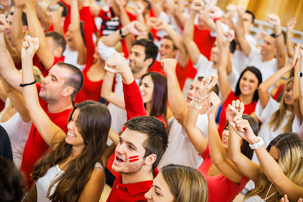 istock Group of ecstatic sport fans cheering. 174079804