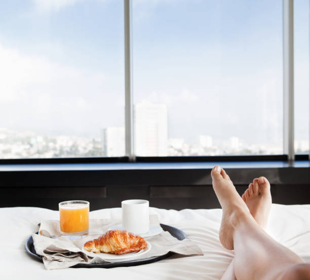 istock Businesswoman having breakfast in bed 174081550