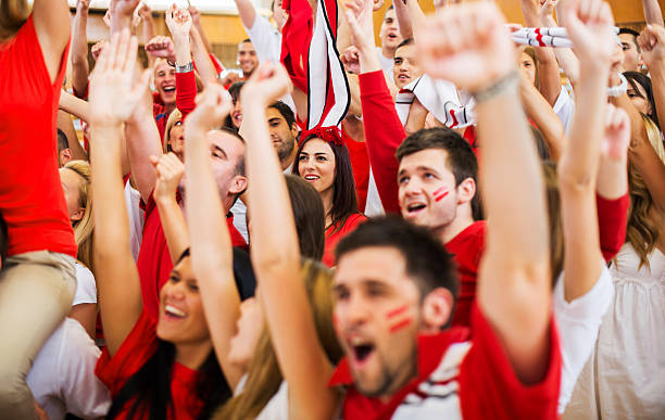 istock Group of ecstatic sport fans cheering. 174081934