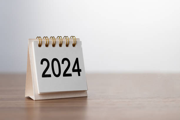 istock 2024 Happy New year background. Turns over a calendar sheet. Setup objective target business cost and budget planning of new year concept. year change from 2023 to 2024. 1740820039