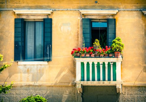 Balcony with flowers in Venice, Italy.