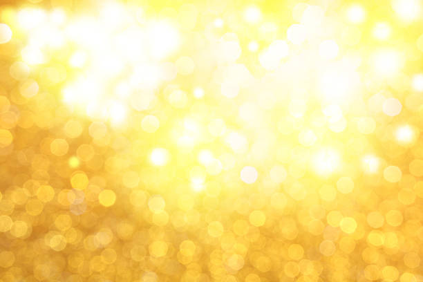 Golden glittery lights stock photo