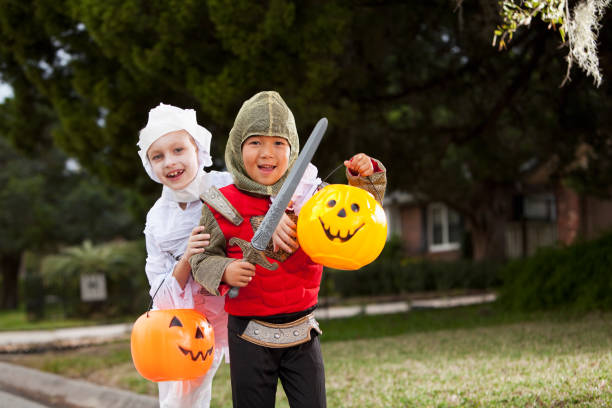 istock Children in halloween costumes 174082489