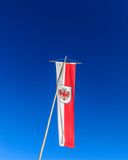 White and red flag with the coat of arms of the Autonomous Province of Bolzano - South Tyrol. Trentino-Alto Adige, Italy.