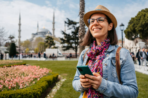istock Tourist Using Phone In Front Of The Blue Mosque In Istanbul 1740830901